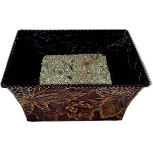 brown Metal Planter with floral pattern on sides